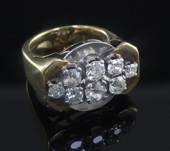 A stylish continental gold and diamond cluster cocktail ring, size L.